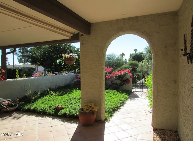 a view of a house with a garden