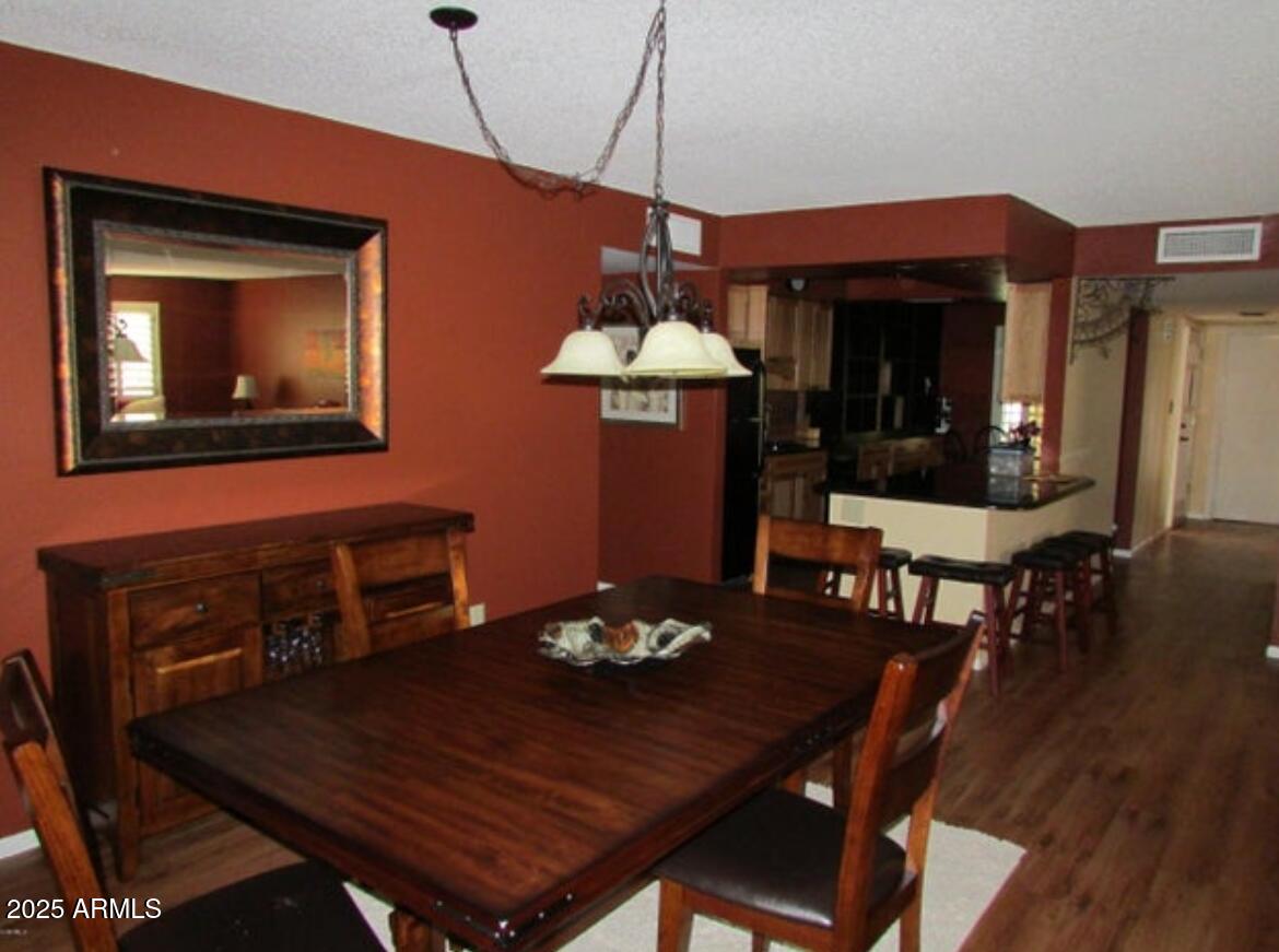 9438 East Michigan Avenue Sun Lakes, AZ 85248 - Photo 5 of 28 a view of a dining room with furniture