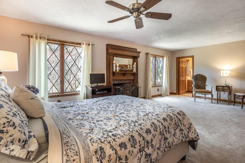 77 Richardson Road Boxborough, MA 01719 - Photo 15 of 32 a bedroom with a large bed and a window