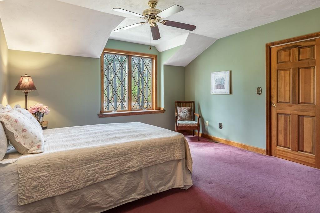 77 Richardson Road Boxborough, MA 01719 - Photo 19 of 32 a bedroom with a bed dresser and a window