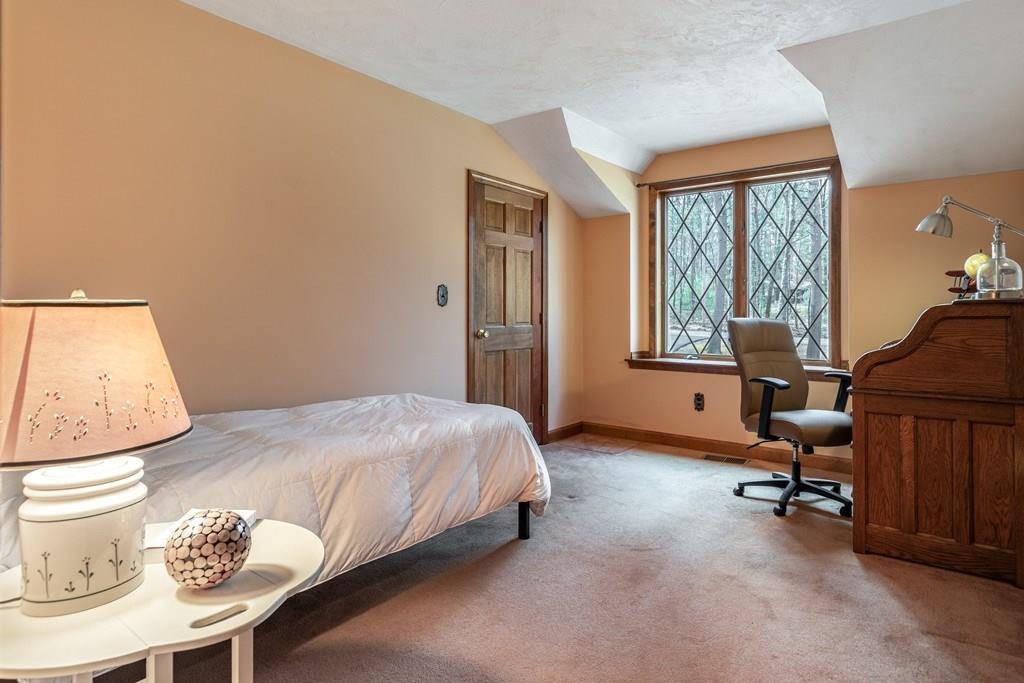 77 Richardson Road Boxborough, MA 01719 - Photo 21 of 32 a bedroom with a bed a chair and next to a window