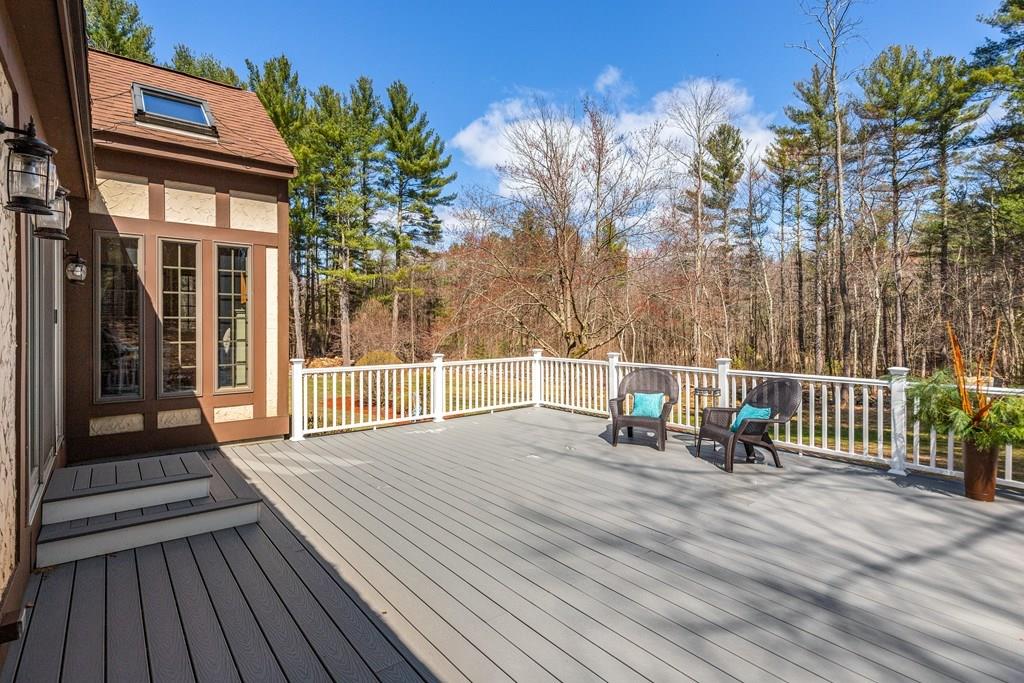 77 Richardson Road Boxborough, MA 01719 - Photo 22 of 32 a view of a chairs on a deck