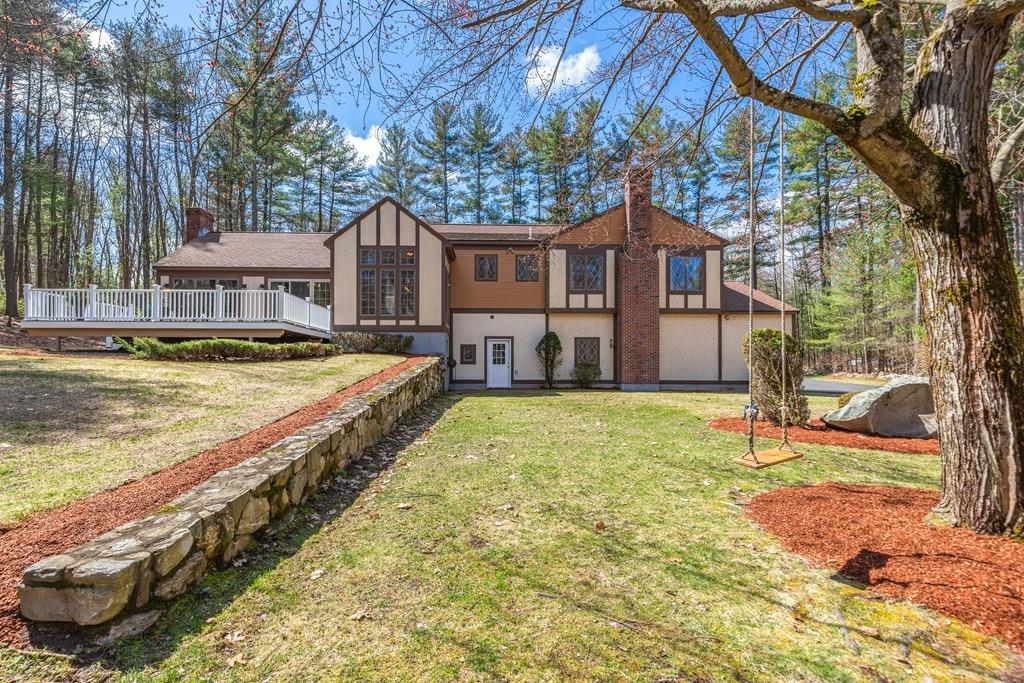 77 Richardson Road Boxborough, MA 01719 - Photo 23 of 32 a swimming pool with outdoor seating and yard