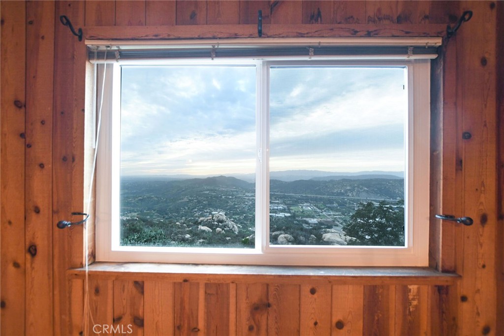 6750 Rainbow Heights Road Fallbrook, CA 92028 - Photo 30 of 64 a view of a glass door with a yard from a window