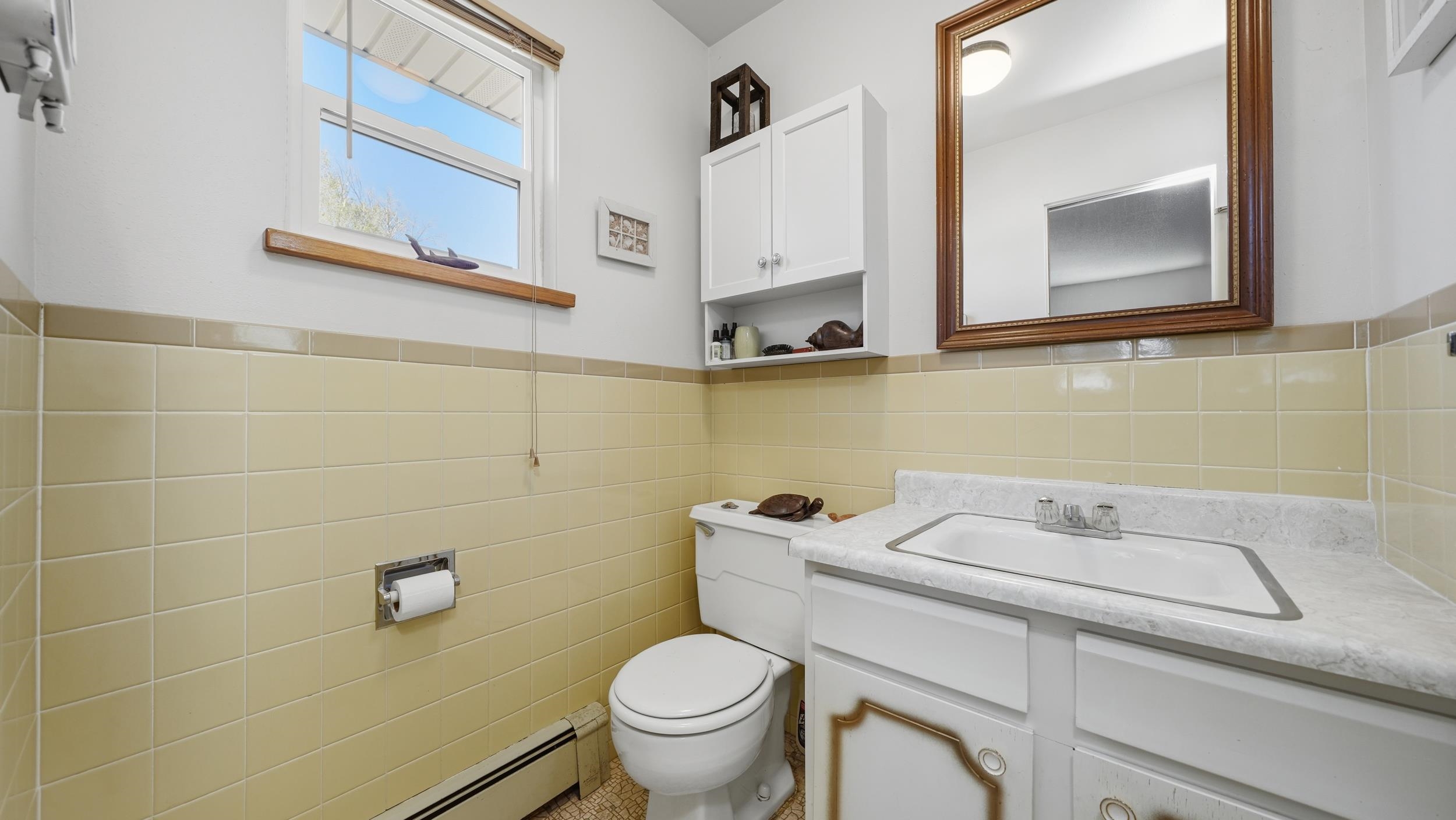 3445 C C 1/2 Road Palisade, CO 81526 - Photo 15 of 37 a bathroom with a sink toilet and mirror