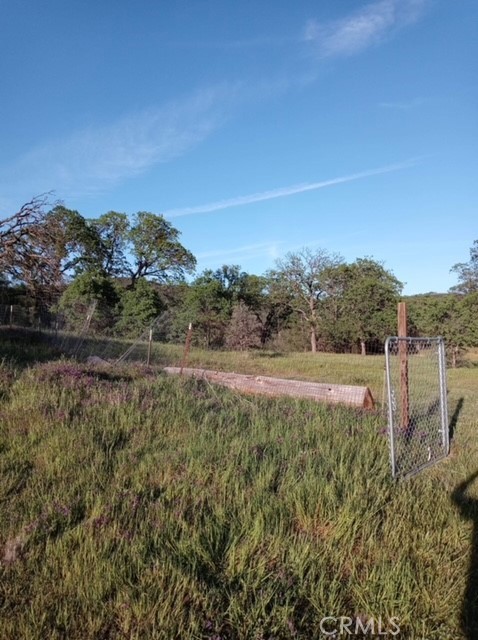 552 Watertrough Road Clearlake Oaks, CA 95423 - Photo 19 of 24 a view of a lake with a mountain in the background