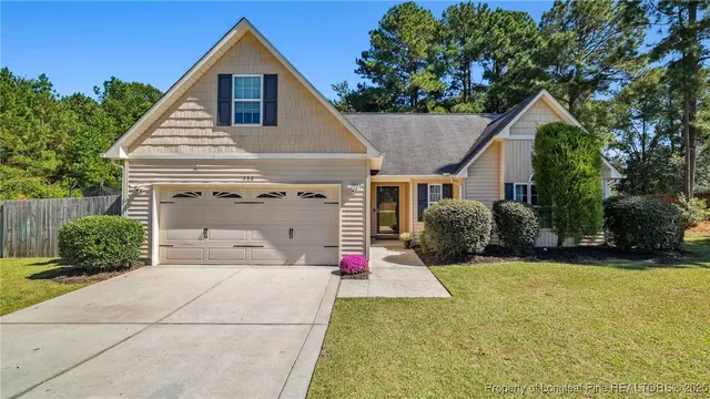 a view of backyard with small garden and plants