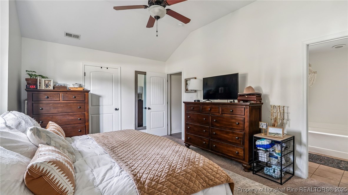 230 Michael Drive Raeford, NC 28376 - Photo 20 of 43 a bedroom with a bed and a television