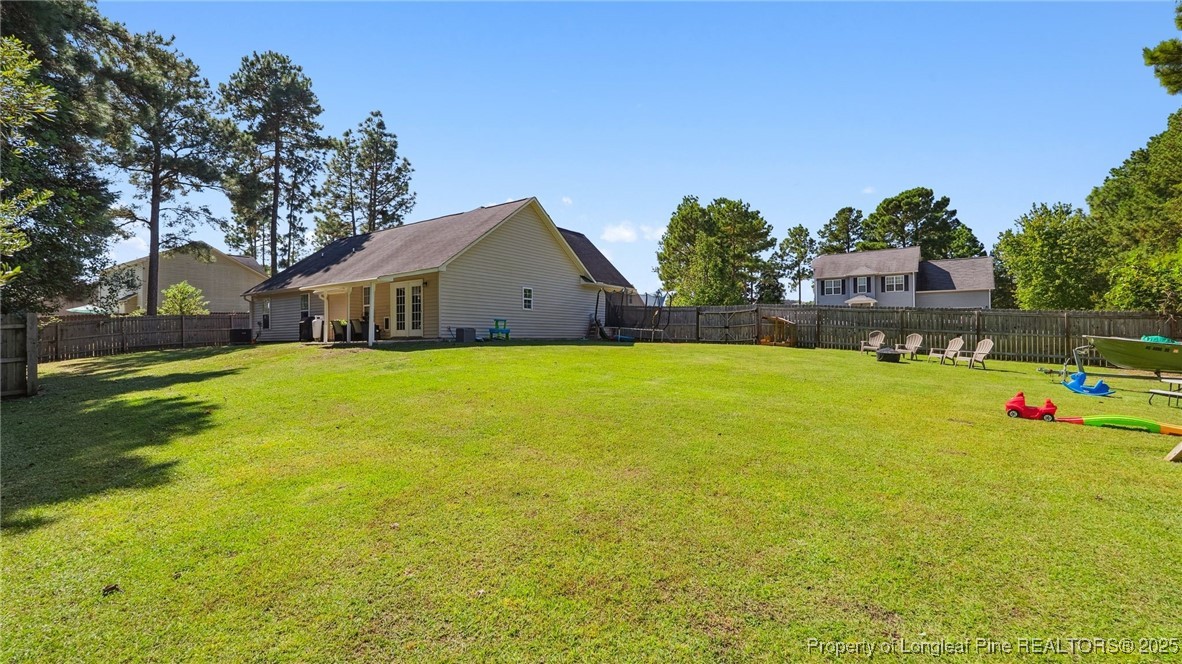 230 Michael Drive Raeford, NC 28376 - Photo 36 of 43 a view of a house with a yard