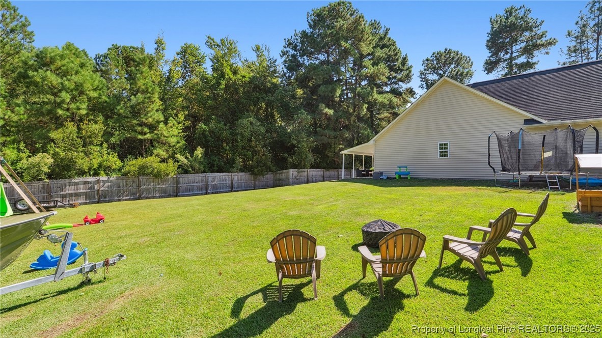 230 Michael Drive Raeford, NC 28376 - Photo 37 of 43 a view of swimming pool with lounge chair