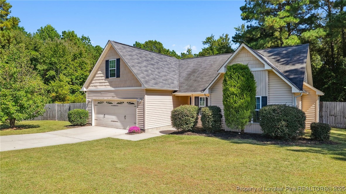 230 Michael Drive Raeford, NC 28376 - Photo 42 of 43 a front view of a house with a yard