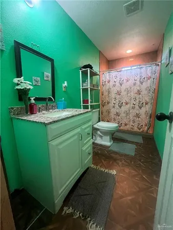 a room with sink furniture and a large window