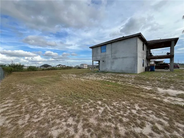 a big room with an outdoor seating