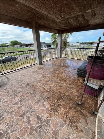 a view of porch with furniture