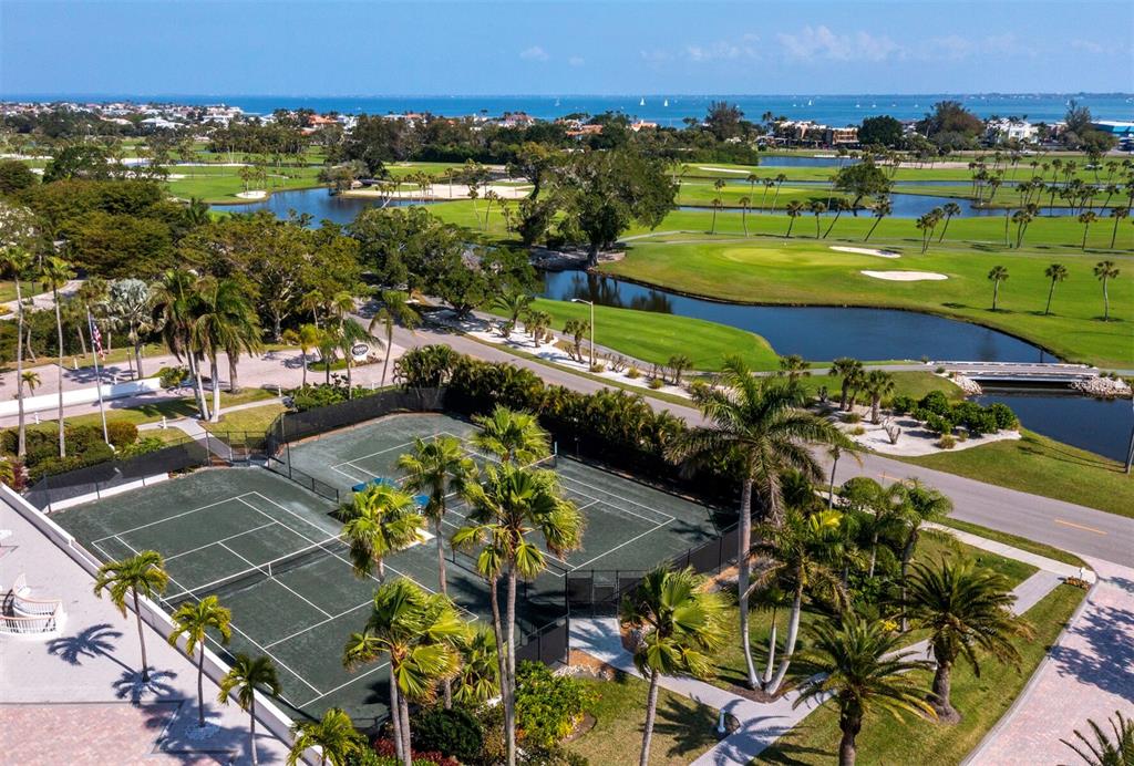 455 Longboat Club Road, Unit 402 Longboat Key, FL 34228 - Photo 38 of 48 an aerial view of a houses with a lake view