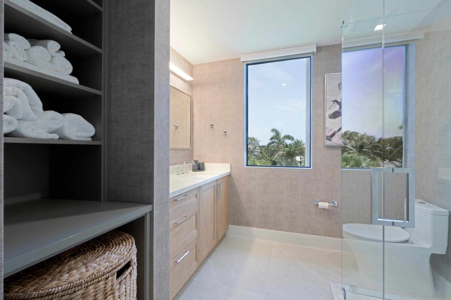 206 Inlet Way, Unit 2W Palm Beach Shores, FL 33404 - Photo 19 of 53 a bathroom with a bathtub and a sink