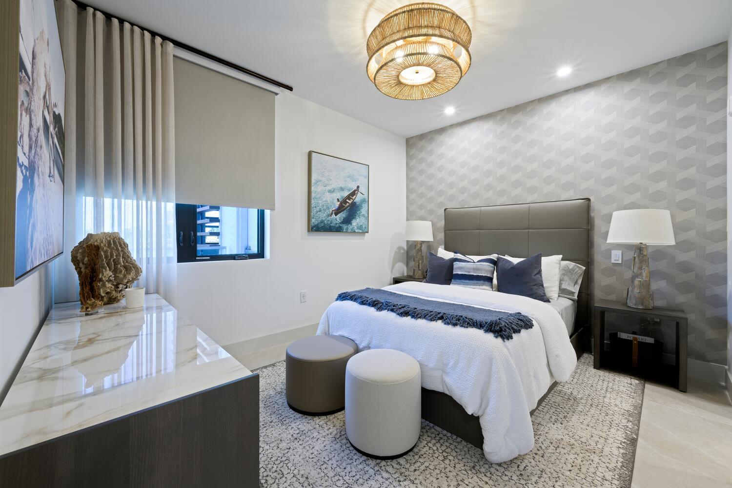 206 Inlet Way, Unit 2W Palm Beach Shores, FL 33404 - Photo 20 of 53 a bedroom with a bed and a chandelier