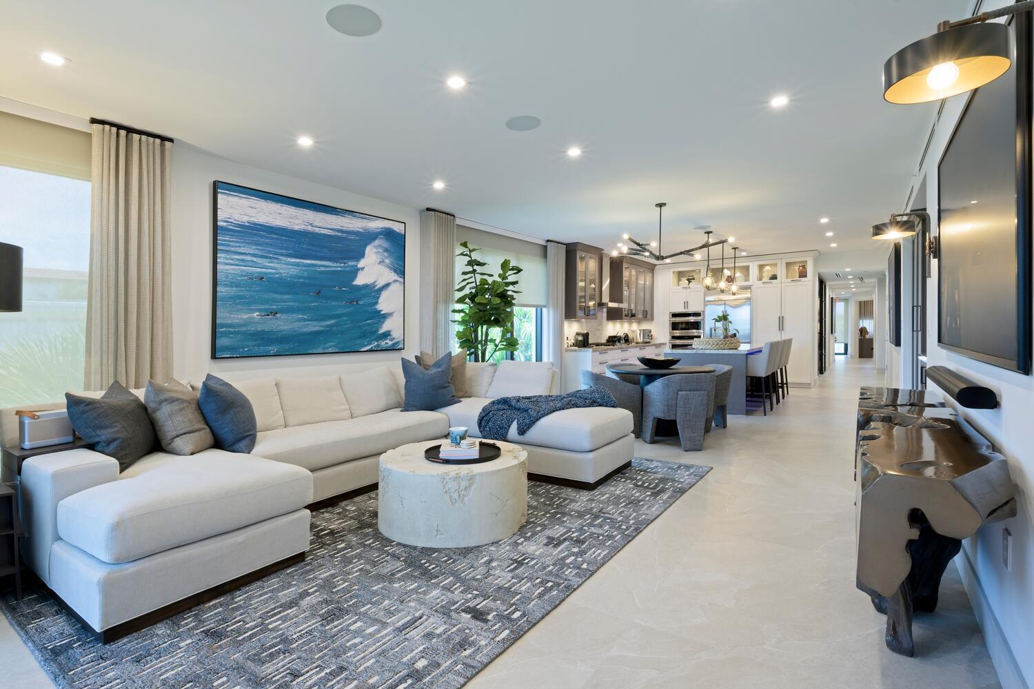 206 Inlet Way, Unit 2W Palm Beach Shores, FL 33404 - Photo 2 of 53 a living room with furniture and a flat screen tv