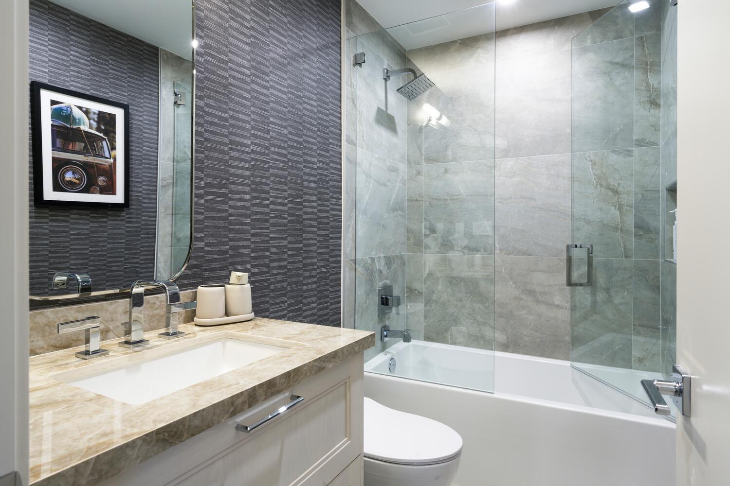 206 Inlet Way, Unit 2W Palm Beach Shores, FL 33404 - Photo 23 of 53 a bathroom with a granite countertop sink a toilet and bathtub