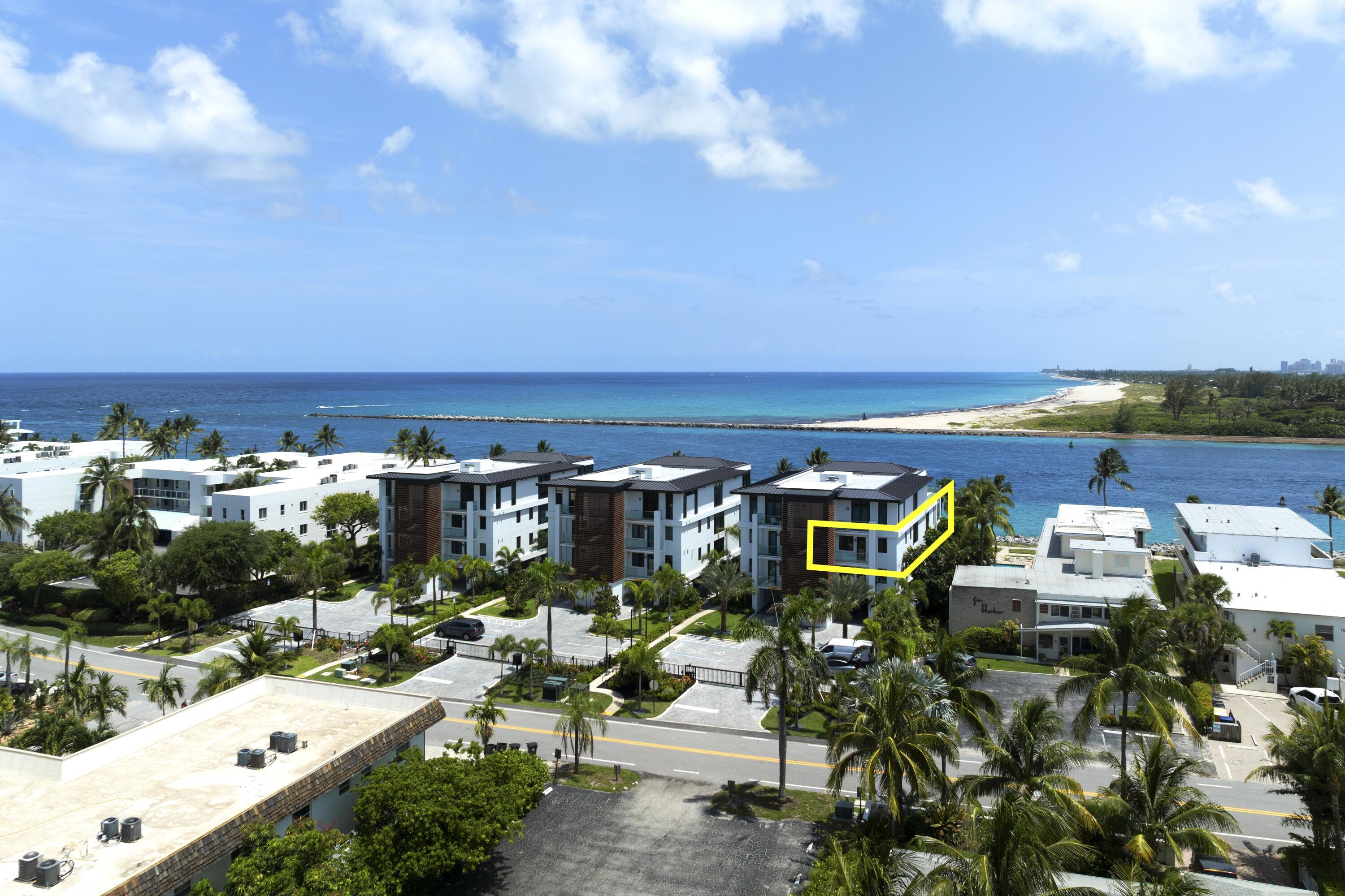 206 Inlet Way, Unit 2W Palm Beach Shores, FL 33404 - Photo 34 of 53 a view of a chairs and table on the terrace