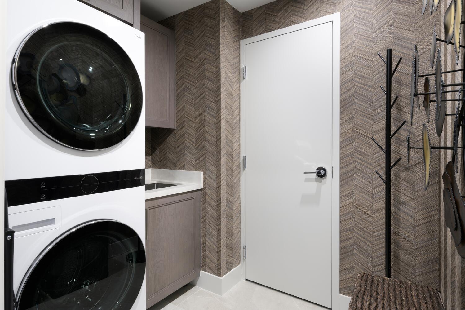 206 Inlet Way, Unit 2W Palm Beach Shores, FL 33404 - Photo 41 of 53 a close up view of a washer and dryer