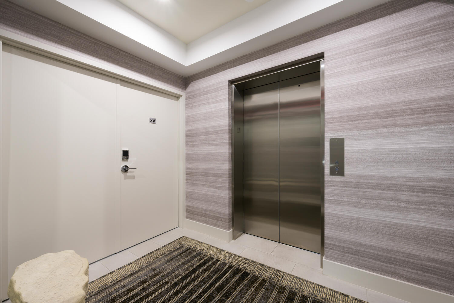 206 Inlet Way, Unit 2W Palm Beach Shores, FL 33404 - Photo 43 of 53 a bathroom with a glass shower door