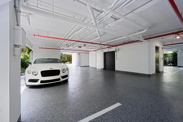 a view of a fountain in front of a house