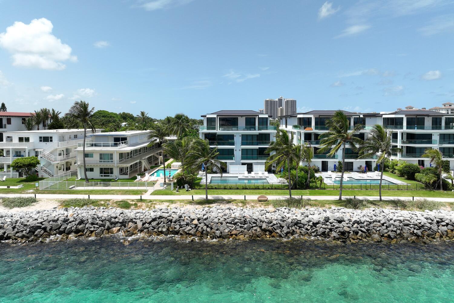 206 Inlet Way, Unit 2W Palm Beach Shores, FL 33404 - Photo 46 of 53 a view of a fountain in front of a house