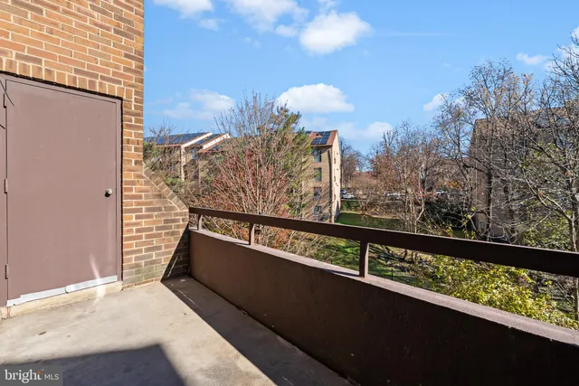 a view of balcony with furniture