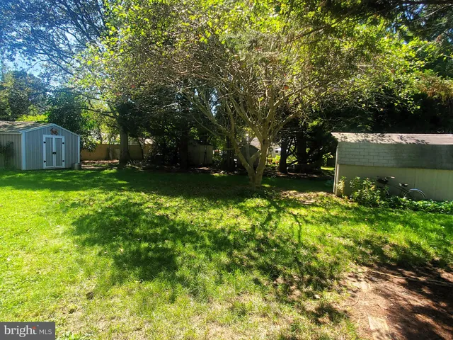 a view of a back yard of the house