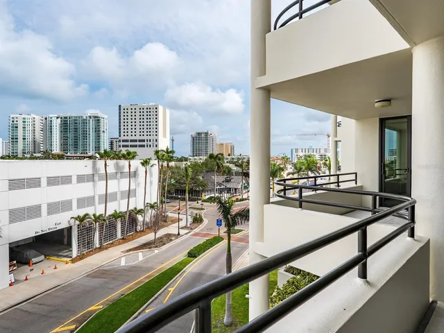 a view of a street with a building