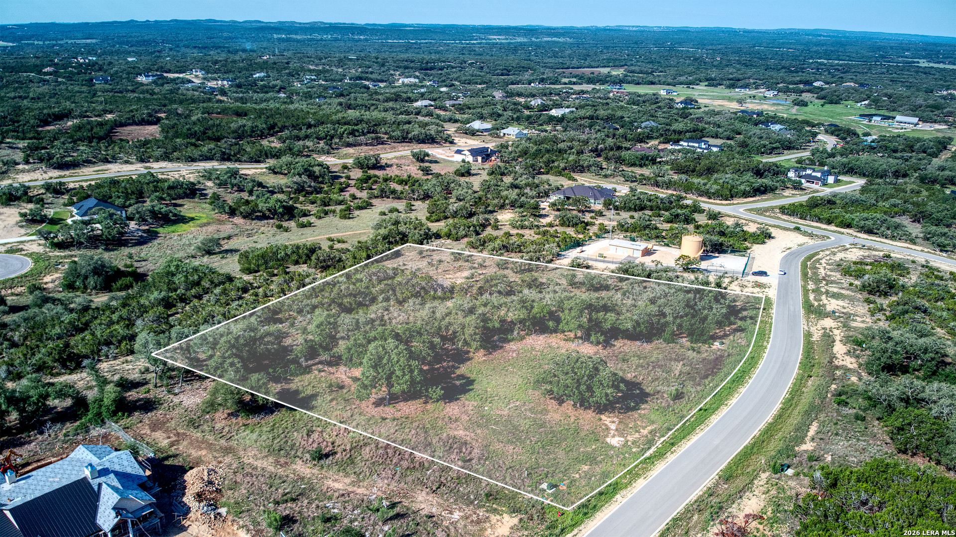 683 Butler Oaks Bulverde, TX 78163 - Photo 2 of 10 an aerial view of residential houses with outdoor space and trees