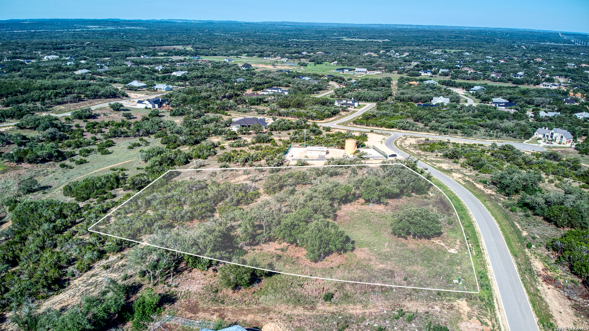 683 Butler Oaks Bulverde, TX 78163 - Photo 3 of 10 an aerial view of residential houses with outdoor space and trees