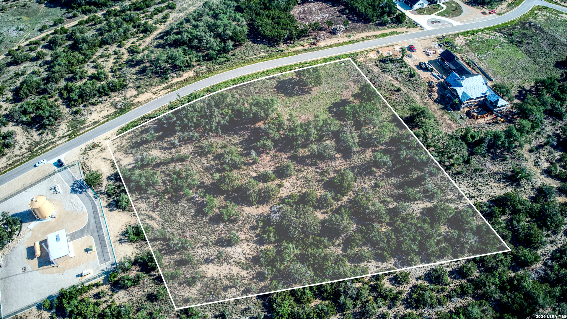 683 Butler Oaks Bulverde, TX 78163 - Photo 4 of 10 a view of a yard with plants