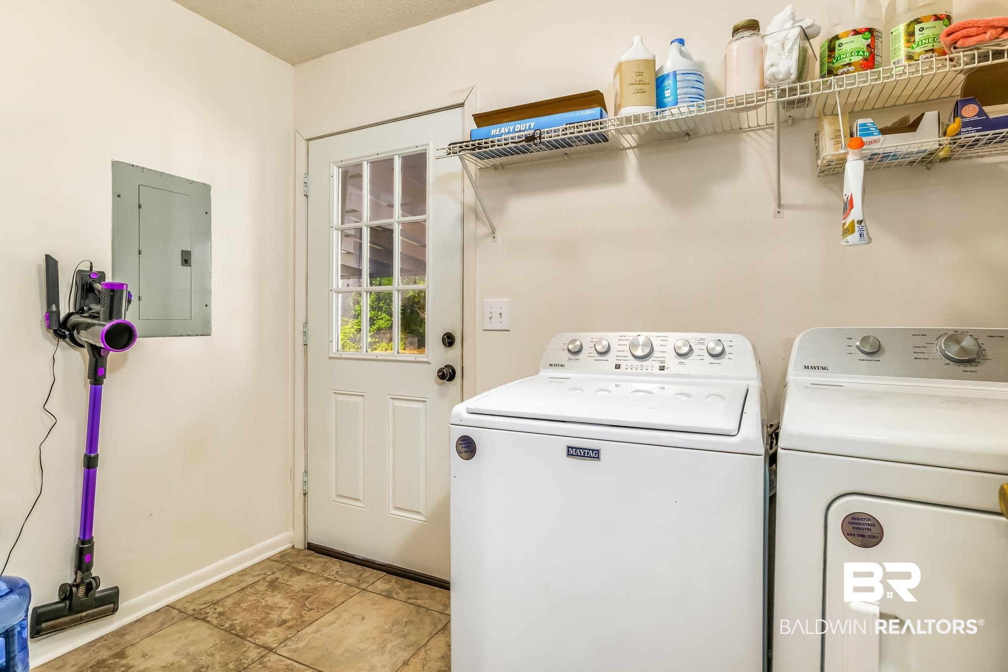 12199 Bay Road West Foley, AL 36535 - Photo 44 of 62 Laundry area with electric panel and washer and dryer