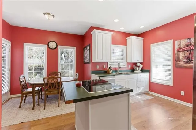 a kitchen that has a sink and a window in it