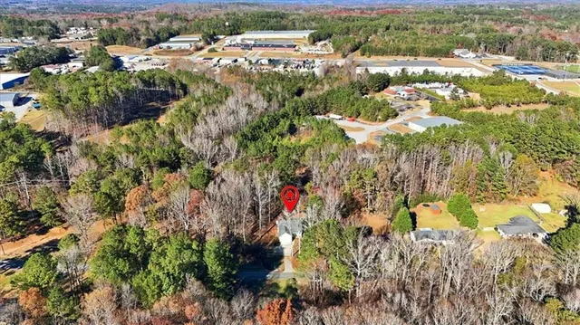 a view of a house with a tree