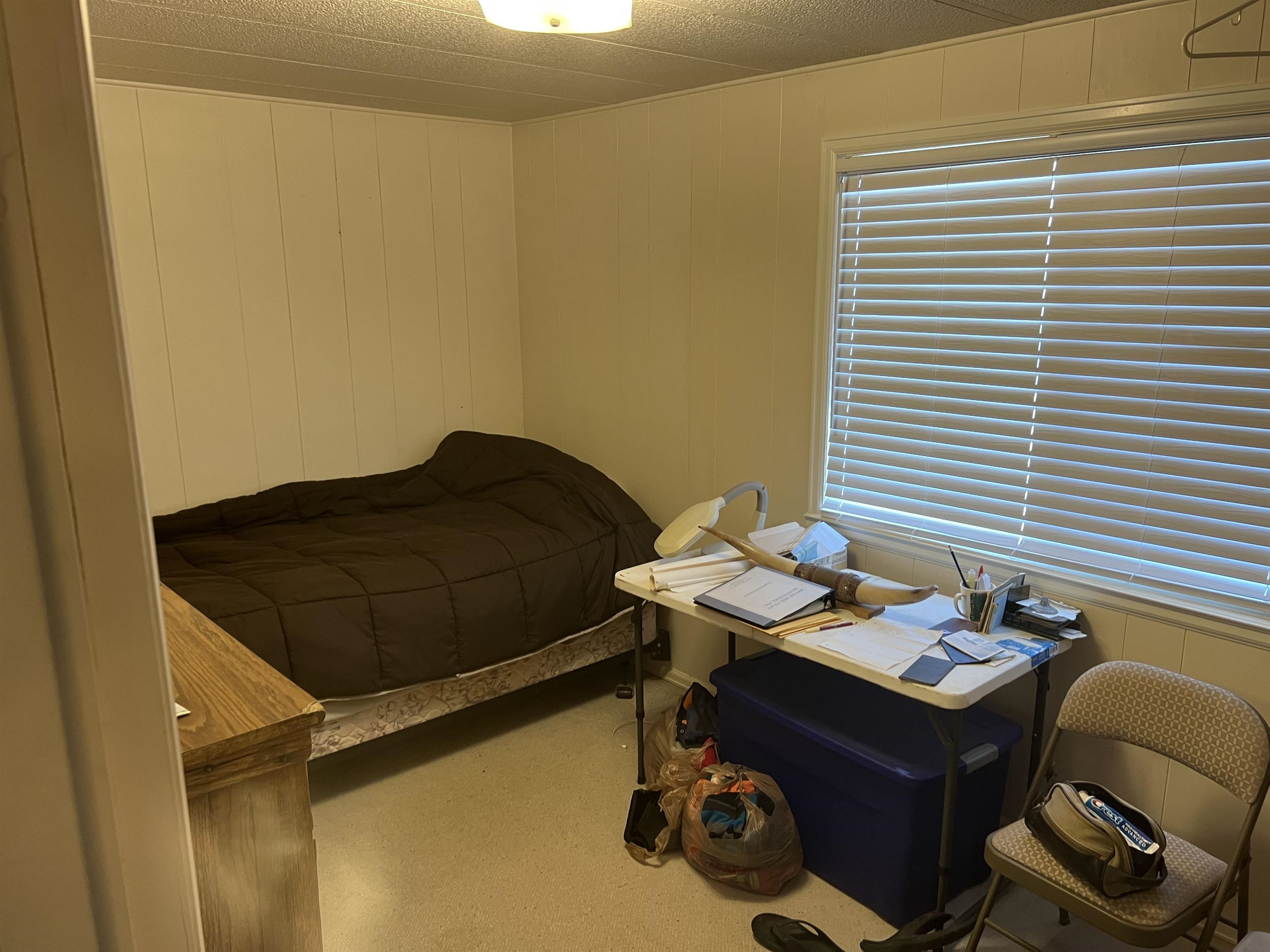 899 R Road Mack, CO 81525 - Photo 13 of 20 a table and a chair with wooden floor