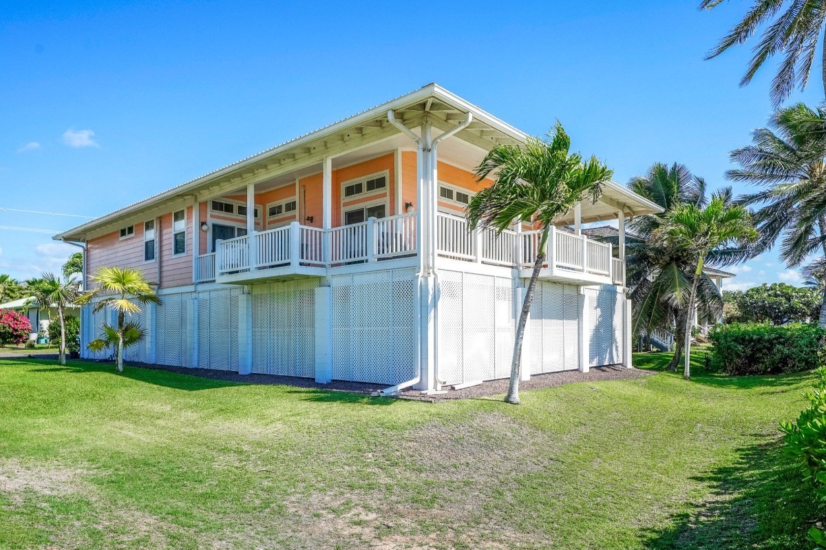 8264 Elepaio Road, Unit B Kekaha, HI 96752 - Photo 4 of 27 a front view of house with yard and entertaining space