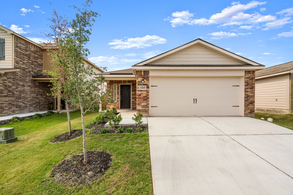 1500 Amy Drive Kyle, TX 78640 - Photo 1 of 1 a view of a house with a yard
