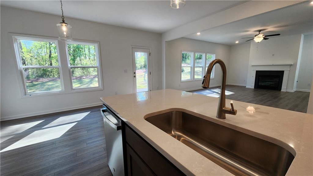 204 Silverleaf Trail Bethlehem, GA 30620 - Photo 11 of 41 a kitchen with a sink and a large window