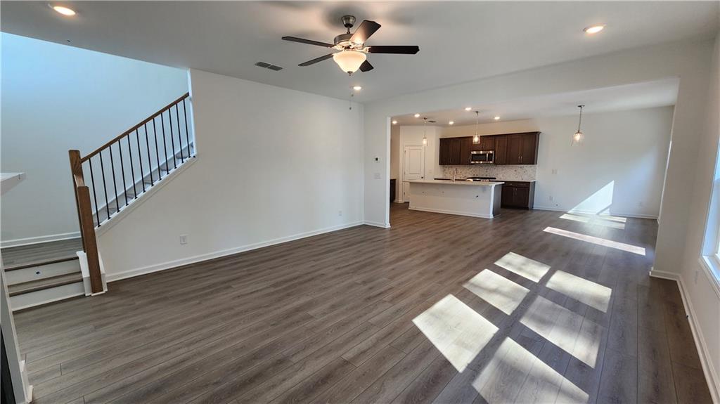 204 Silverleaf Trail Bethlehem, GA 30620 - Photo 15 of 41 a view of living room with furniture and a ceiling fan