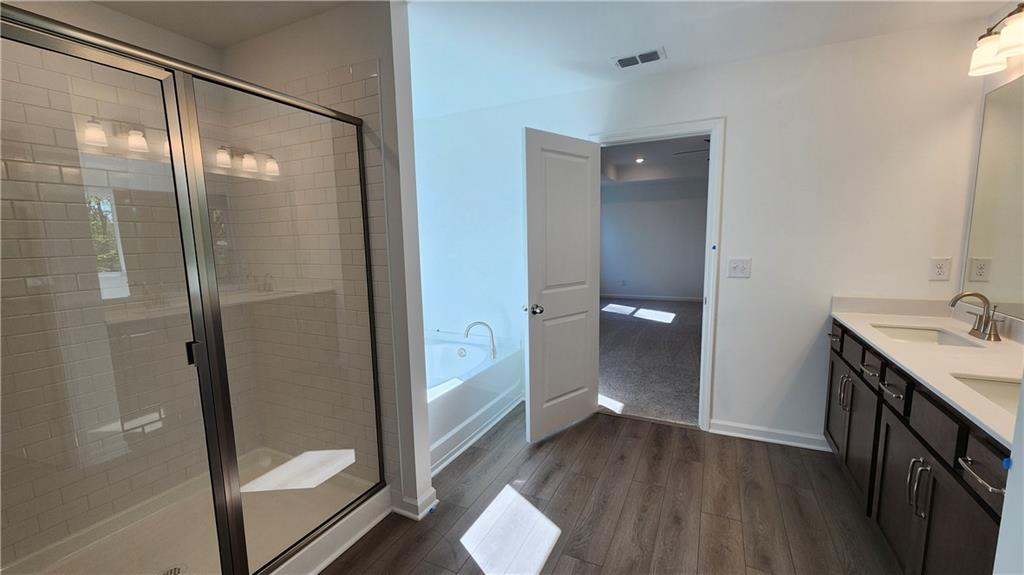 204 Silverleaf Trail Bethlehem, GA 30620 - Photo 19 of 41 a bathroom with a sink and mirror