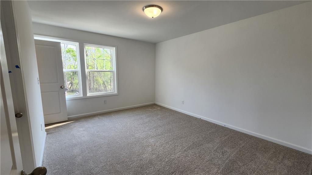 204 Silverleaf Trail Bethlehem, GA 30620 - Photo 24 of 41 an empty room with a window