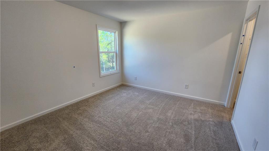 204 Silverleaf Trail Bethlehem, GA 30620 - Photo 25 of 41 an empty room with windows