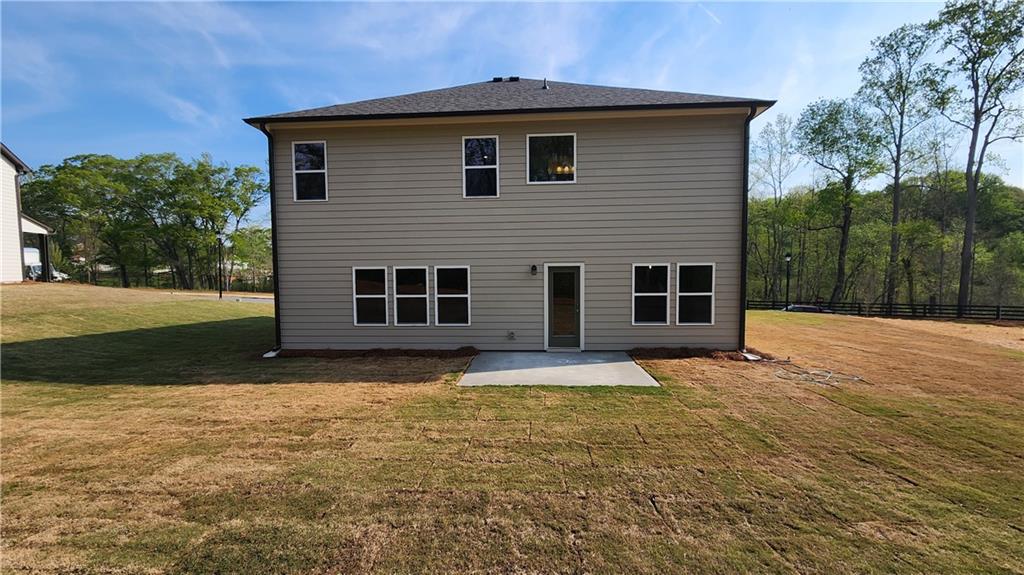 204 Silverleaf Trail Bethlehem, GA 30620 - Photo 28 of 41 a front view of a house with a yard