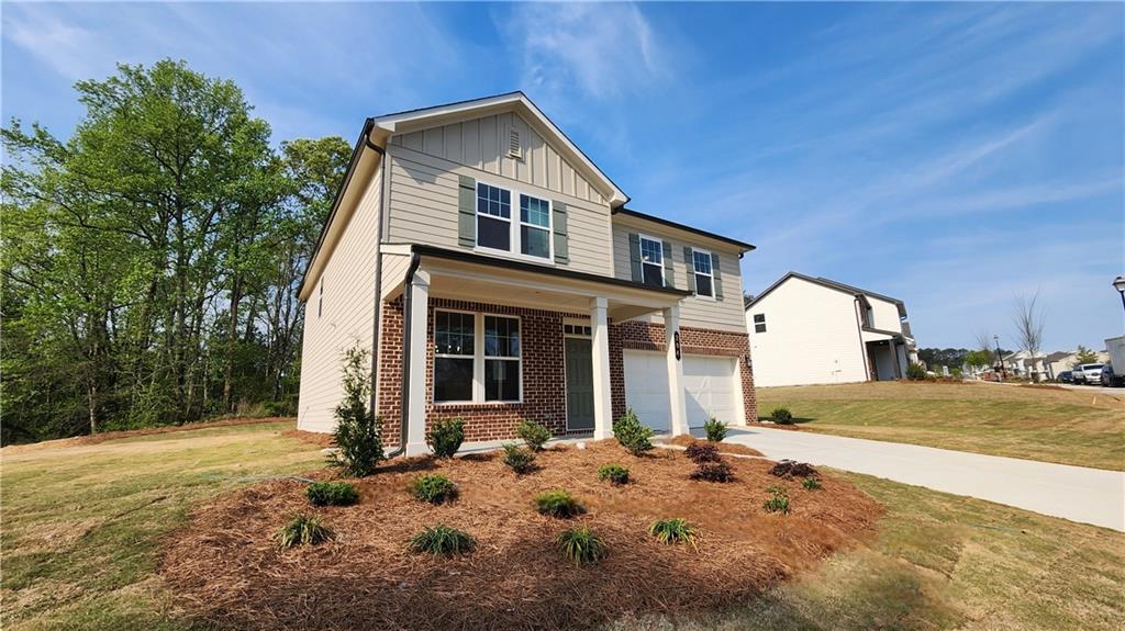 204 Silverleaf Trail Bethlehem, GA 30620 - Photo 3 of 41 a front view of a house with a yard