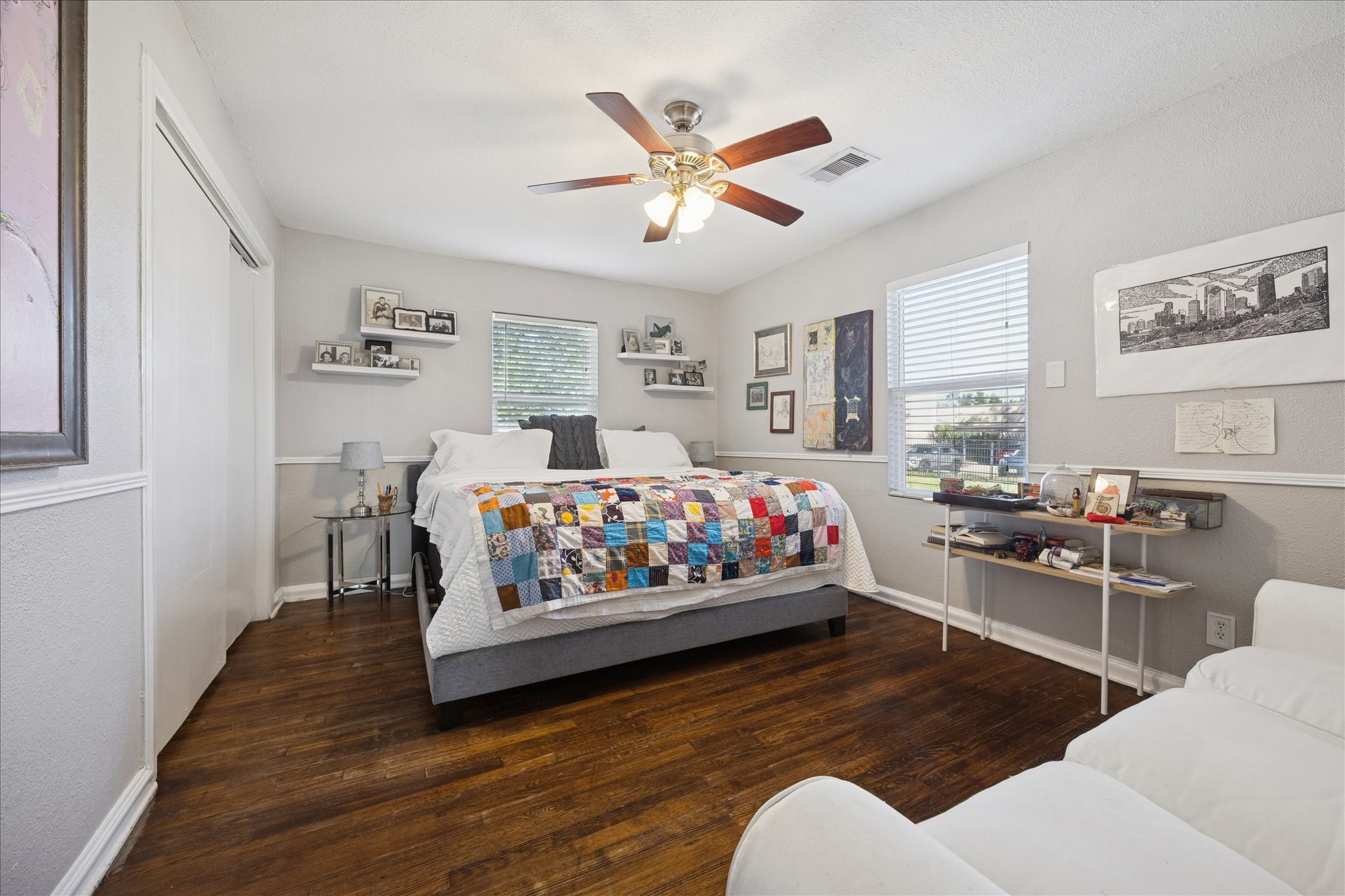 5651 Truett Street Houston, TX 77023 - Photo 13 of 19 a bedroom with bed and a couch