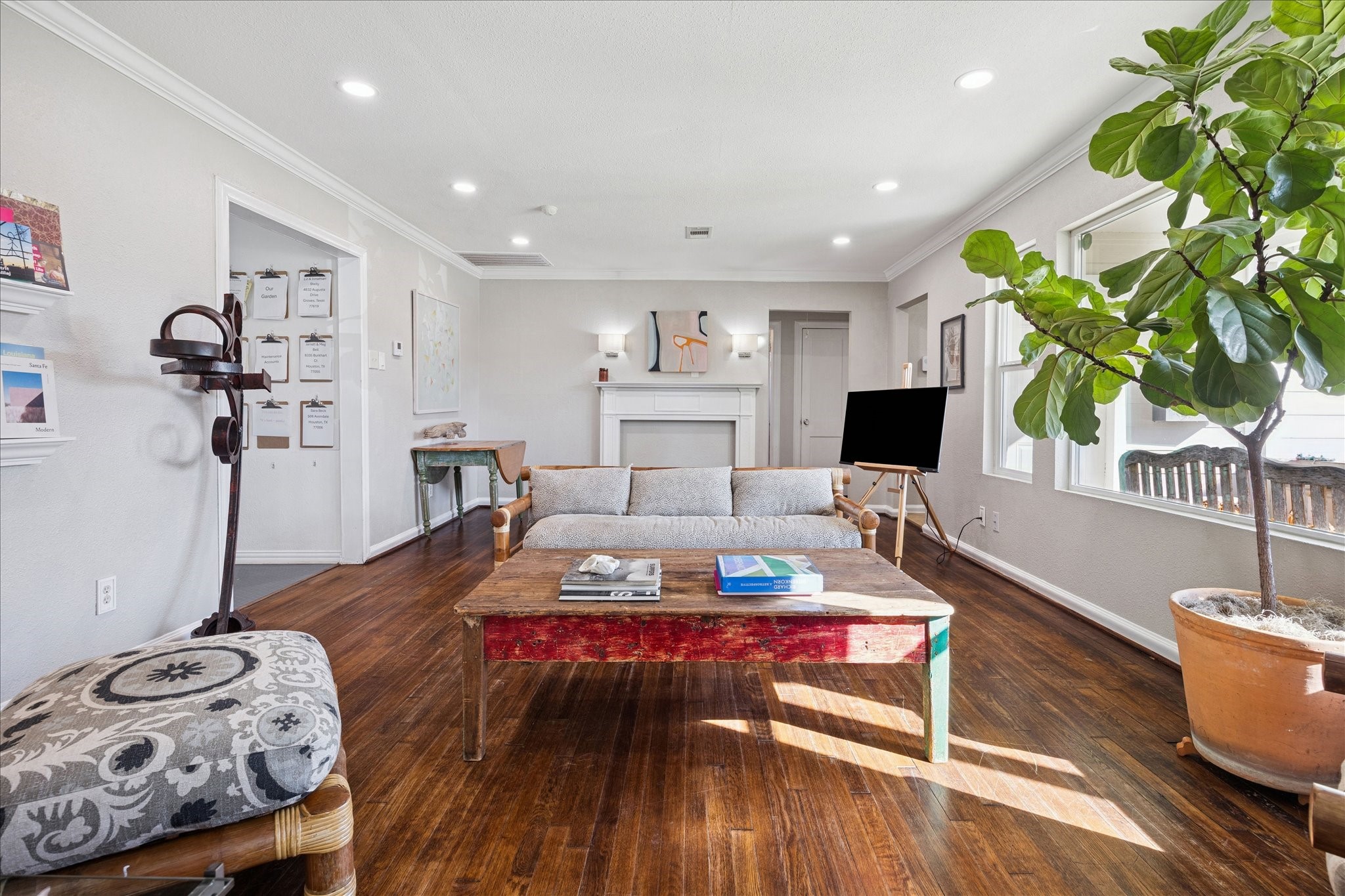 5651 Truett Street Houston, TX 77023 - Photo 5 of 19 a living room with furniture and a table
