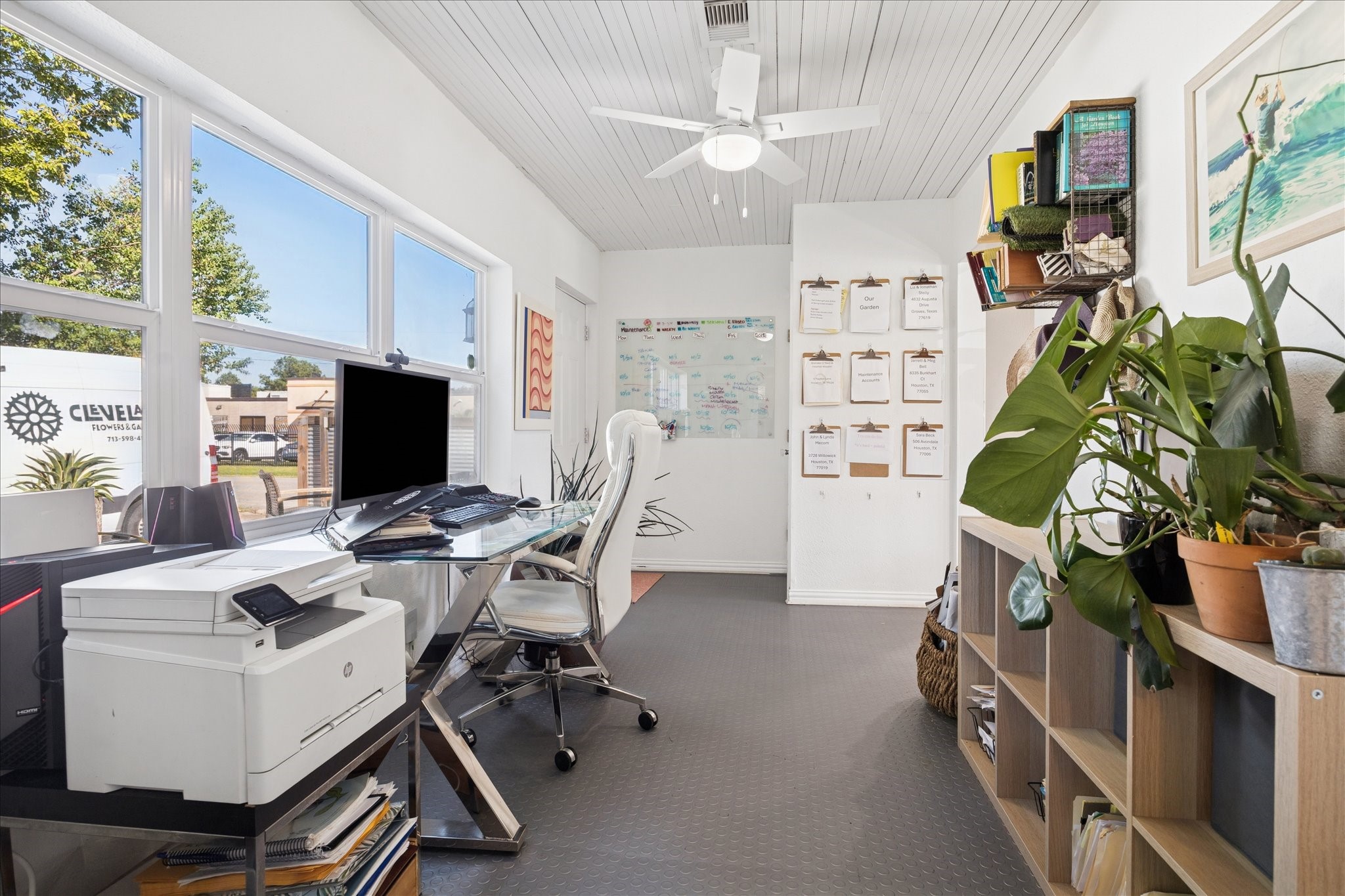 5651 Truett Street Houston, TX 77023 - Photo 7 of 19 a view of a workspace with furniture and a window